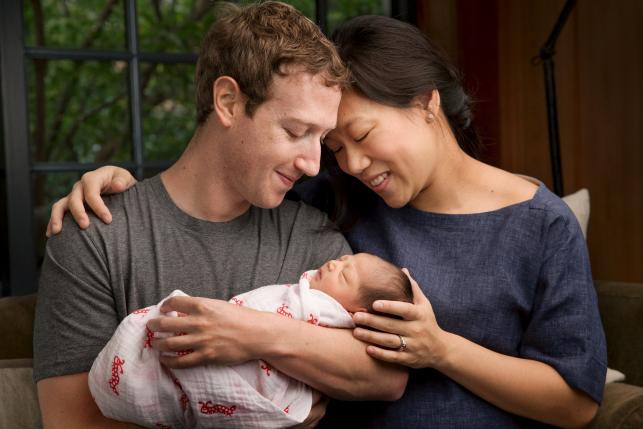 Facebook Inc. Chief Executive Mark Zuckerberg and his wife Priscilla are seen with their daughter named Max in this image released on December 1, 2015. REUTERS/Courtesy of Mark Zuckerberg/Handout