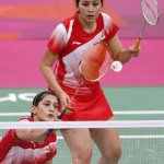 India’s Jwala Gutta and Ashwini Ponnappa play against Taiwan during their women’s doubles group play stage Group B badminton match during the London 2012 Olympic Games at the Wembley Arena