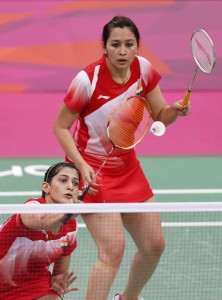 India's Jwala Gutta and Ashwini Ponnappa play against Taiwan's Cheng Wen-hsing and Chien Yu-chin during their women's doubles group play stage Group B badminton match during the London 2012 Olympic Games at the Wembley Arena July 30, 2012. REUTERS/Bazuki Muhammad (BRITAIN - Tags: SPORT BADMINTON SPORT OLYMPICS) - RTR35OV8